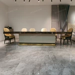 High-Gloss Amber Burl Wood Dining Table with Cream Quilted Leather Base and Metal Inlay
